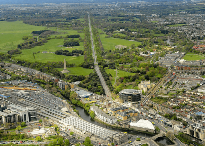 Aerial view of Dublin’s Phoenix Park, the Wellington Monument and surrounding cityscape including Heuston Station and the train tracks.